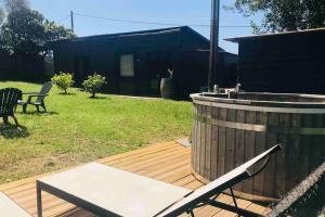 Maisons de vacances La cabane des vignes avec spa nordique : photos des chambres