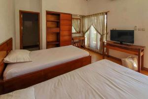 Rumah Eyang Tardjo Syariah Mitra RedDoorz