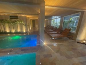 Jardim das Palmeiras II Home Resort - Imperdível - Vista Piscina - Suíte - Ubatuba