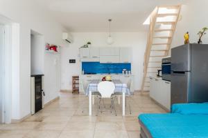 Appartamento fronte mare - Waterfront apartment