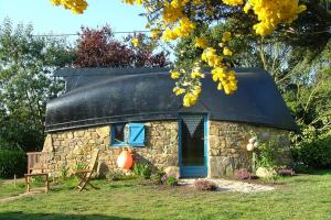 Appartements La Quille en l'air de Kastell Dinn - Unique et insolite -cuisine commune : photos des chambres