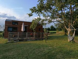 Chalets Tiny House dans jardin prive a la campagne : photos des chambres