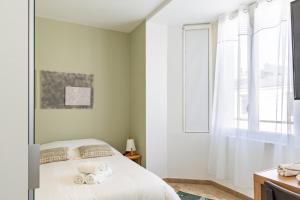 Appartements Pierres Noires - Coup de coeur : studio neuf et cosy, proche centre-ville et Fac / stationnement gratuit / 100m du bus : photos des chambres