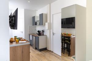 Appartements Pierres Noires - Coup de coeur : studio neuf et cosy, proche centre-ville et Fac / stationnement gratuit / 100m du bus : photos des chambres