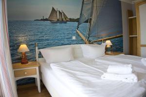 mit Meerblick und Balkon, gratis Nutzung vom AHOI Erlebnisbad und Sauna in Sellin - Meeresblick FeWo 22