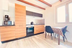 Appartements Appartement cosy avec jardin chaleureux : photos des chambres