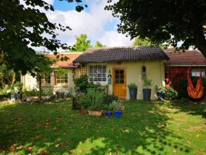 B&B / Chambres d'hotes Villa le Cloky : Appartement - Vue sur Jardin