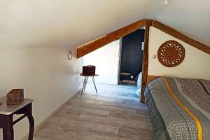 Maisons de vacances Petite maison de charme : photos des chambres