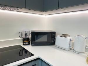 Newpointe Stunning 1-bedroom Serviced Apartment