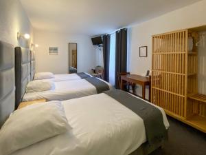 Hotels Hotel Les Tilleuls de Pareloup a Salles-Curan : photos des chambres