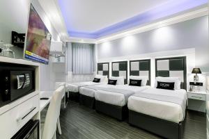 Superior Quadruple Room room in THE ONE Boutique Hotel & SPA - Adults Only