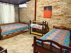 Charmosa casa com churrasq na praia de Camburi