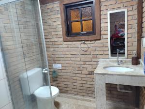 Charmosa casa com churrasq na praia de Camburi