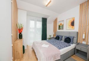 Apartament Klimt nad jeziorem Juno w Mragowie