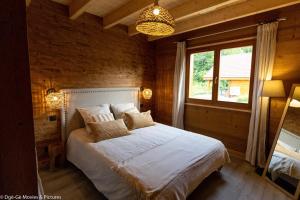 Chalets Les Jardins du Herisson Chalet 2 : photos des chambres