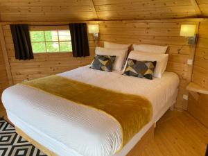 Lodges Aux Kotas Finland'Ain : photos des chambres