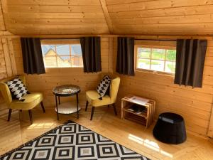 Lodges Aux Kotas Finland'Ain : photos des chambres