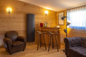 Chalets Gite&Spa le Montagnard : photos des chambres