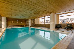 Appartements travelski home select - Residence L'Ecrin des Sybelles 4 stars by Travelski : photos des chambres