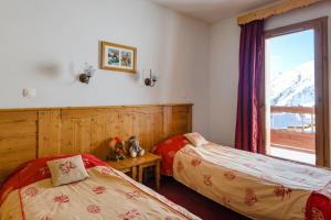 Appartements travelski home select - Residence L'Ecrin des Sybelles 4 stars by Travelski : Appartement 1 Chambre