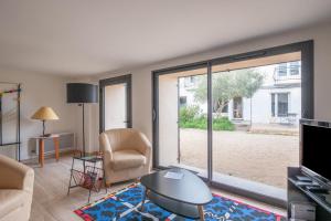 Maisons de vacances Maison pour 6 - Jardin - 950m de la plage : photos des chambres