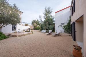 Maisons de vacances Maison pour 6 - Jardin - 950m de la plage : photos des chambres