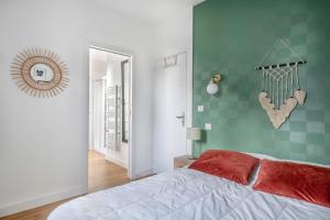 Maisons de vacances Charmante villa Bauloise : photos des chambres