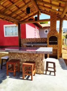 Acomodação chalé entre capitolio e escarpas do lago