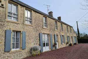 Maisons de vacances Maison sejour spacieux lumineux avec jardin et exterieur amenage terrain de petanque proche Omaha beach, Grandcamp Maisy et pointe du Hoc : photos des chambres