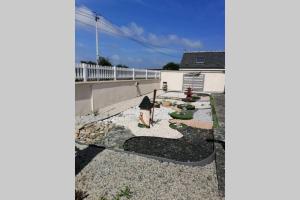 Maisons de vacances Maison sejour spacieux lumineux avec jardin et exterieur amenage terrain de petanque proche Omaha beach, Grandcamp Maisy et pointe du Hoc : photos des chambres