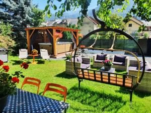 Chalets Cosy Lodge au pied de l'Alpe D'Huez Sport et Detente Jacuzzi Piscine Sauna Bar Billard : photos des chambres