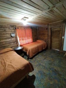 Habitaciónes estilo cabaña las Herraduras