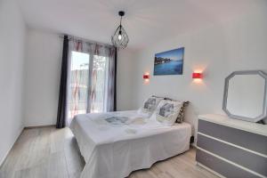 Appartements Superbe Appart de 50 m2 face au vieux village : photos des chambres