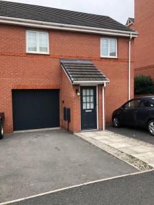 Modern stylish flat over garage with free parking