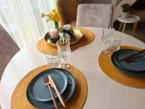 Čiki puki apartamentai Pienės pūkas