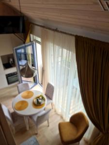 Čiki puki apartamentai Pienės pūkas