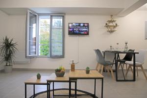 Appartements #Cosy Moments By Eauz'Homes - WiFi-Netflix : photos des chambres