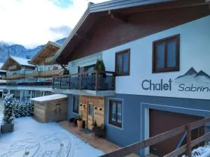 Chalet Sabrina mit Außenpool im Sommer - Kitzsteinhorn