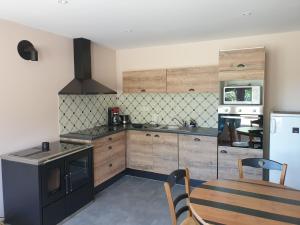 Appartements T2 CHEZ LE MARECHAL a NEBOUZAT : photos des chambres
