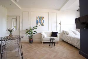 Appartements V' Appart Spa Haussmannien : photos des chambres