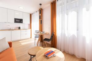 Appartements Apparts Seasons - Saint Etienne - La Terrasse : photos des chambres