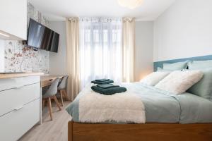 Appartements Apparts Seasons - Saint Etienne - La Terrasse : photos des chambres