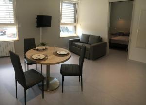 Appartements Le Nid des Coucous : photos des chambres