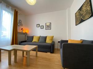 Appartements Vichy Gare - Parking - Cosy - Jardin - labellise Clevacances 3 etoiles : photos des chambres