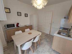 Appartements Vichy Gare - Parking - Cosy - Jardin - labellise Clevacances 3 etoiles : photos des chambres