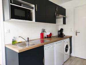 Appartements LE FOUCAULD-GoodCaen : photos des chambres