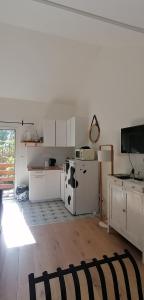 Appartements Charmante maisonnette : photos des chambres