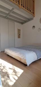 Appartements Charmante maisonnette : photos des chambres