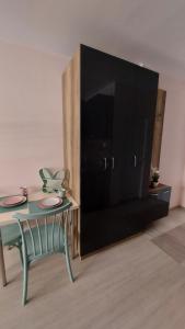 HostEx Pastello Deluxe Studio