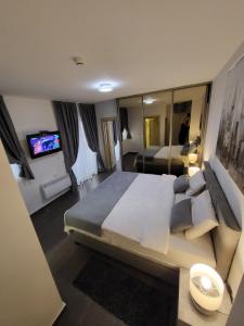 Two-Bedroom Apartment room in Olympic Apartments Wellness & Spa